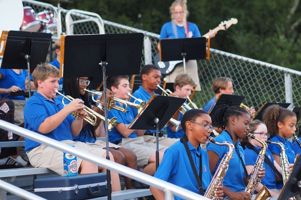 pep band playing at football game