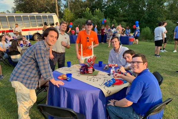 Alumni at football tailgate