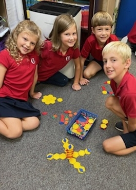 Grammar School Students using Math Manipulatives