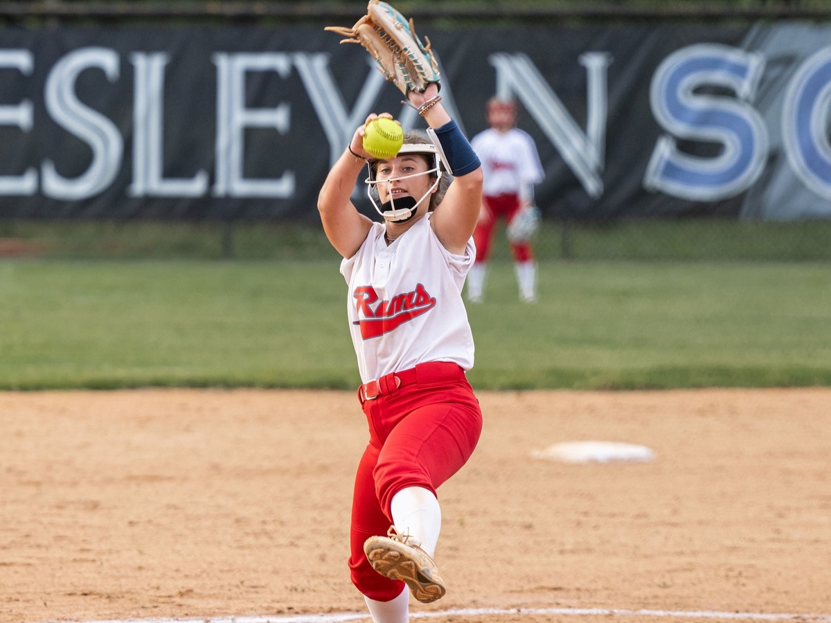 softball player pitching