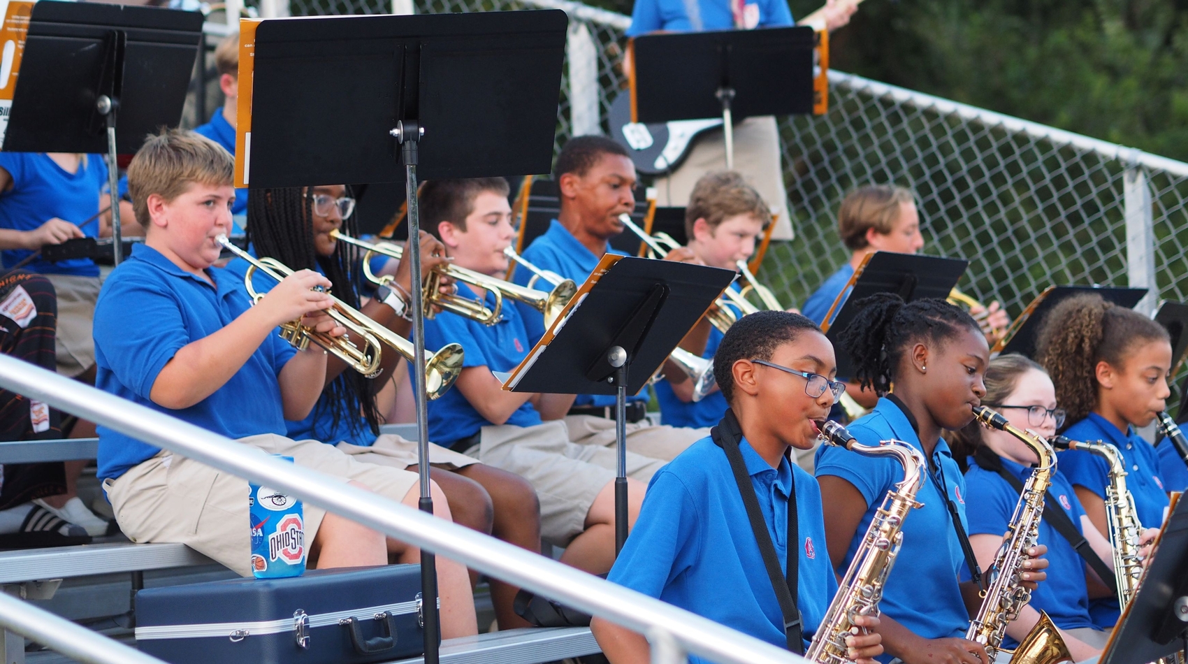 Pep Band playing instruments at football game